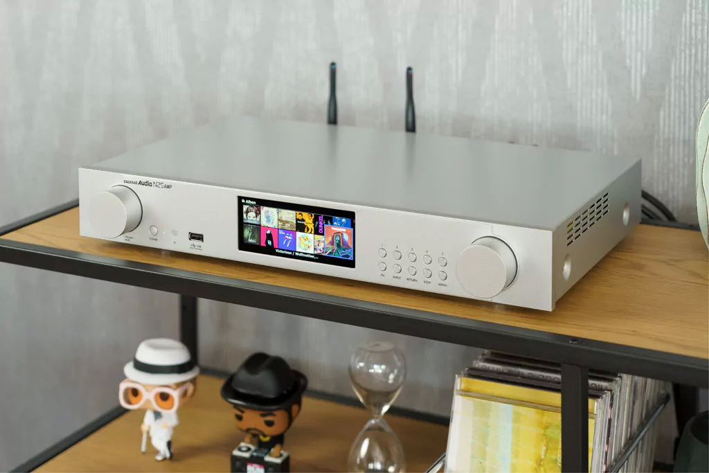 How to Set Up an AV Receiver for Dolby Atmos, eARC, and Room Calibration 11 AV receiver connected to TV, speakers, subwoofer, and calibration microphone for Dolby Atmos and eARC setup