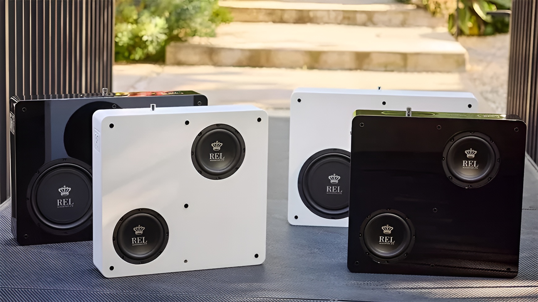 Designed for contemporary interiors, the REL Planar PL-1 and PL-2 replace bulky subwoofer cabinets with sleek on-wall performance.