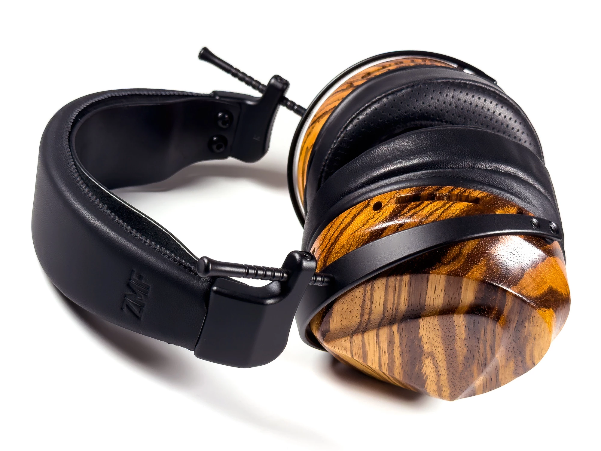 ZMF Caldera Closed Brings Planar Ambition to a Sealed Flagship 11 ZMF Caldera Closed flagship closed-back planar headphones with wooden ear cups